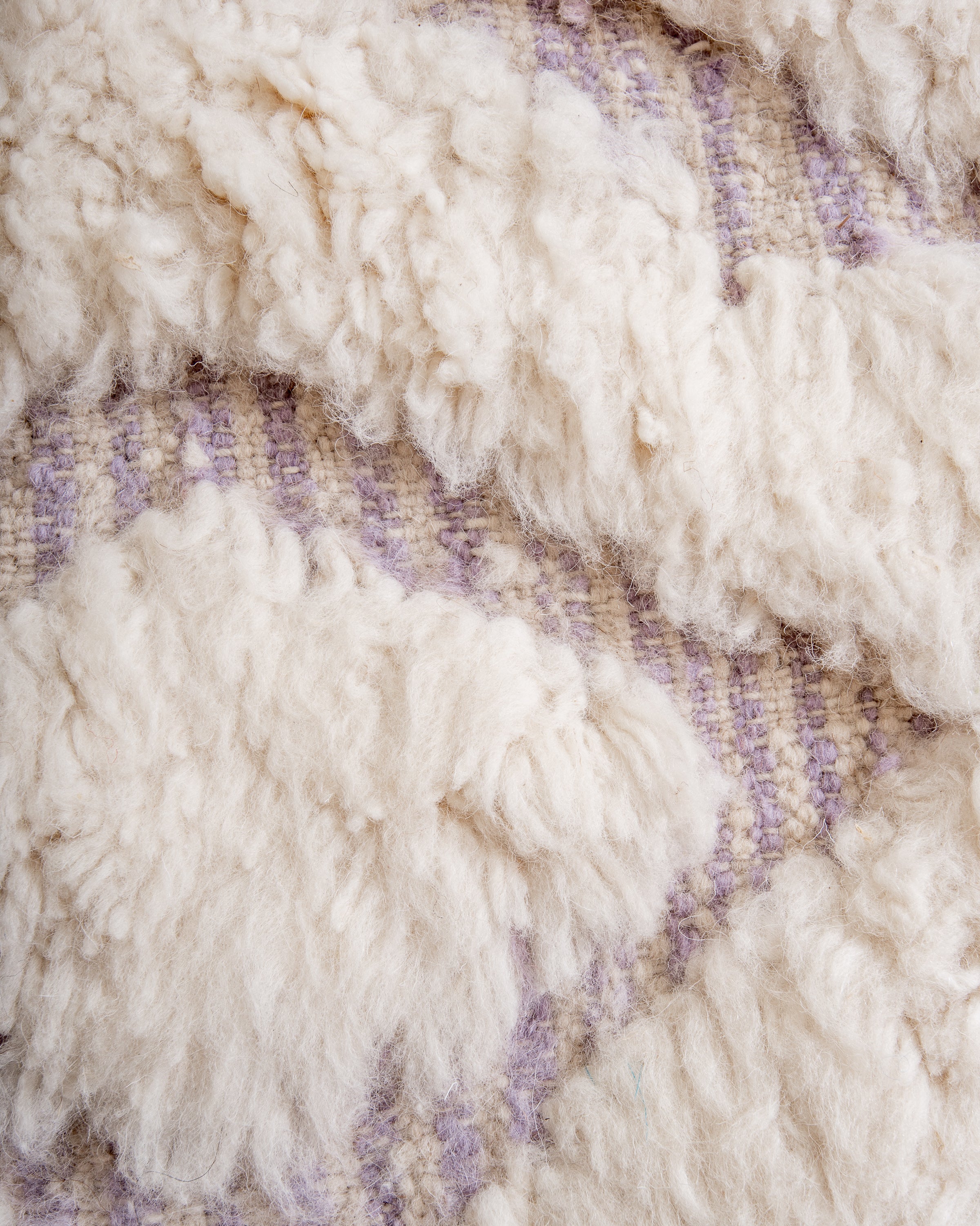 Modern, designer, handcrafted Berber rug from Morocco. Beniourain with beautiful colors and patterns and fluffy wool texture.